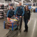 State troopers with a cart full of board games