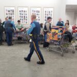 State troopers with donations in cart