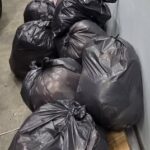 Trash bags full of stuffed animals