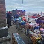 State troopers and baskets full of toys outside of walmart