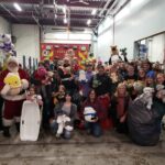Volunteers with stuffed animals