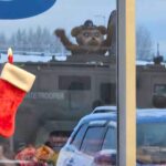 State trooper mascot in the window