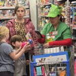 Volunteer shopping with an elf