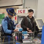 State trooper with a volunteer