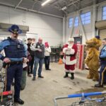 State troopers and volunteers huddled around