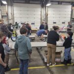 kids next with a bike on the table