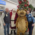 State troopers with mascot and Santa
