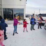 Unloading toys from State Troopers vehicles.