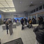 Volunteers bringing in and setting up tables